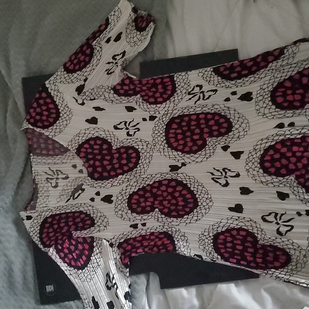 Size L shirt by "RADIANCE "